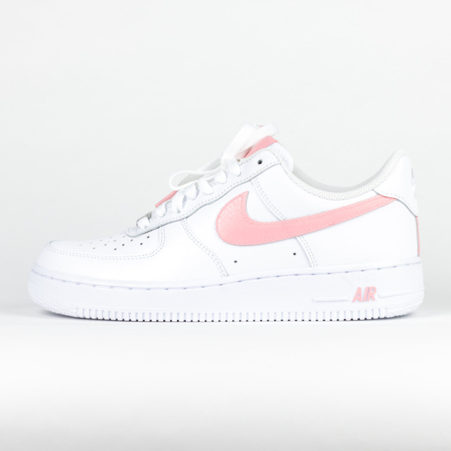 air force ones with pink nike sign