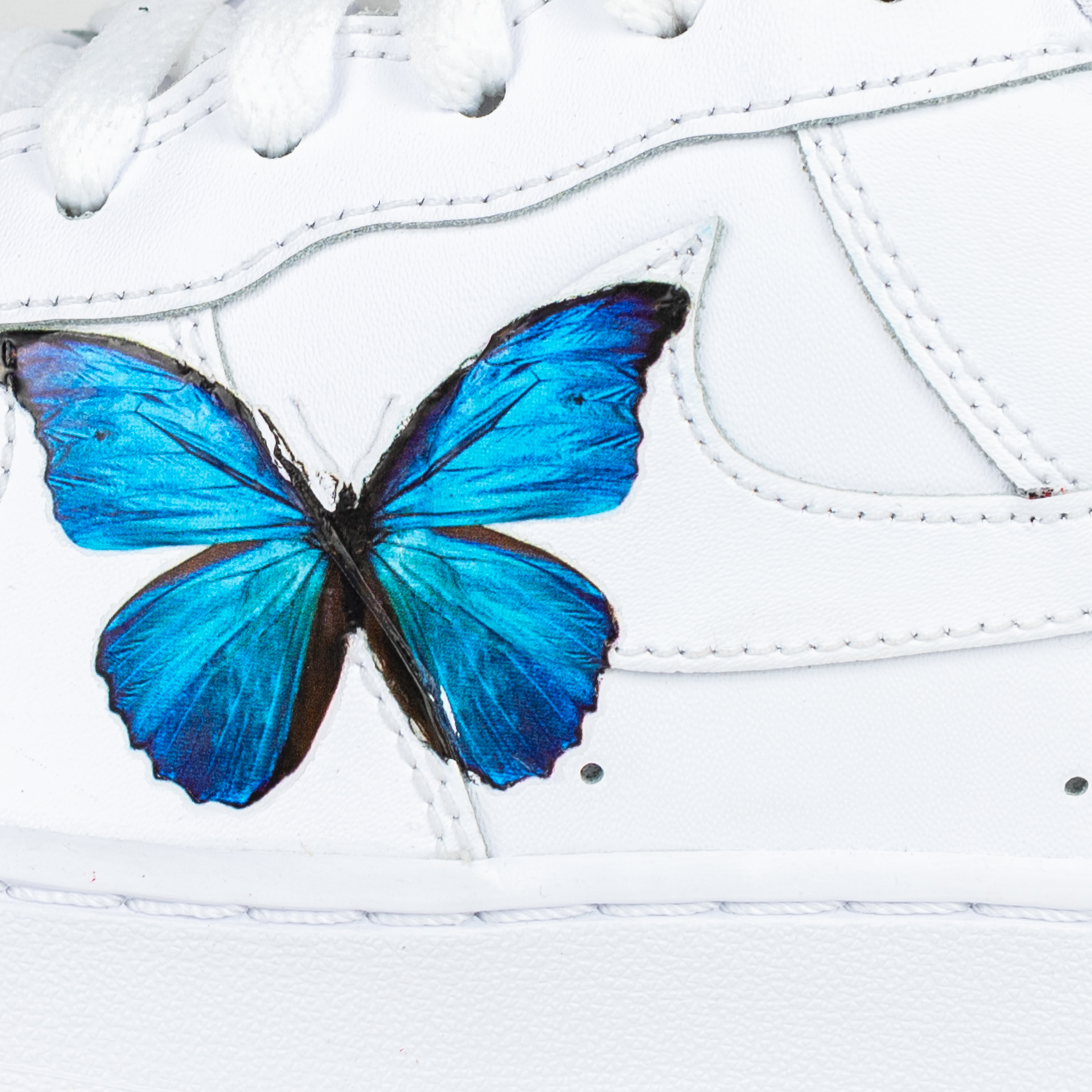 nike with blue butterflies