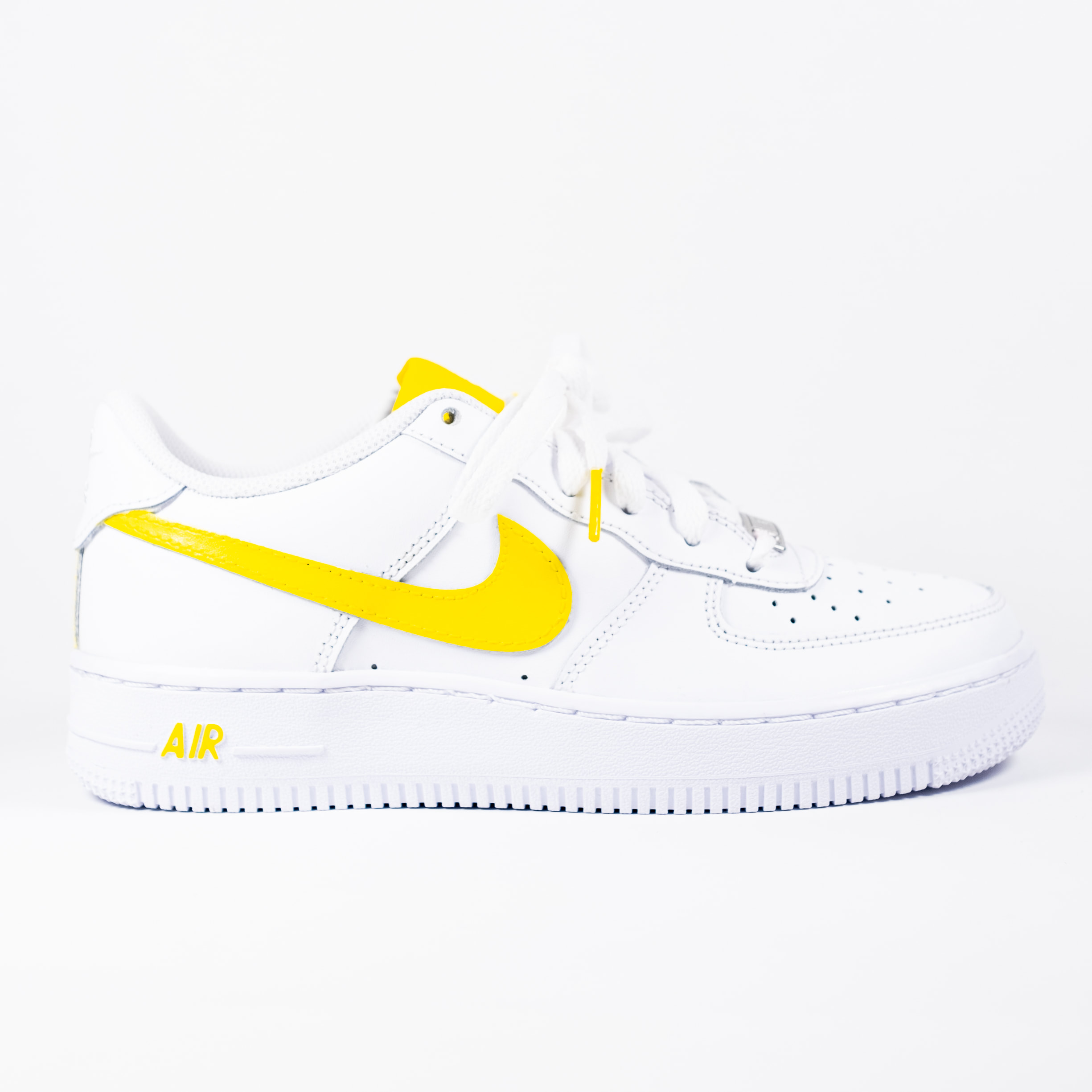 nike air force 1 white with yellow swoosh